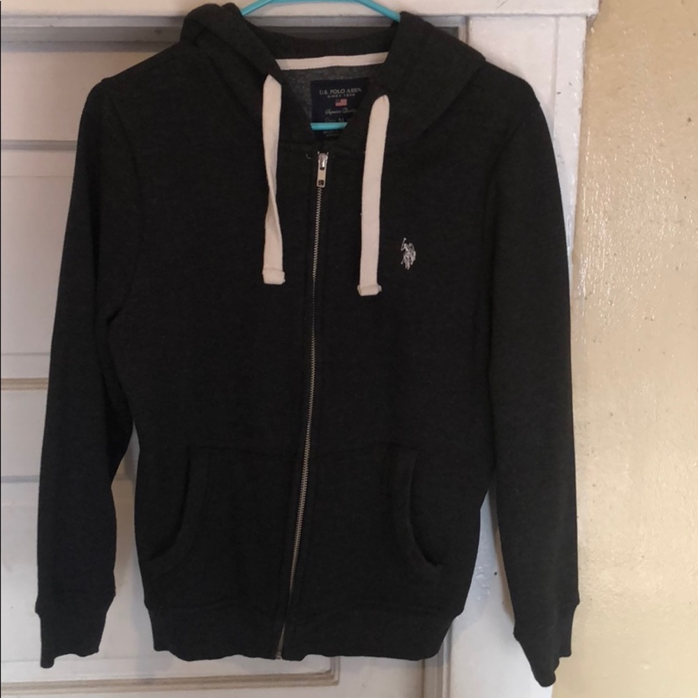 Zip up sweater.